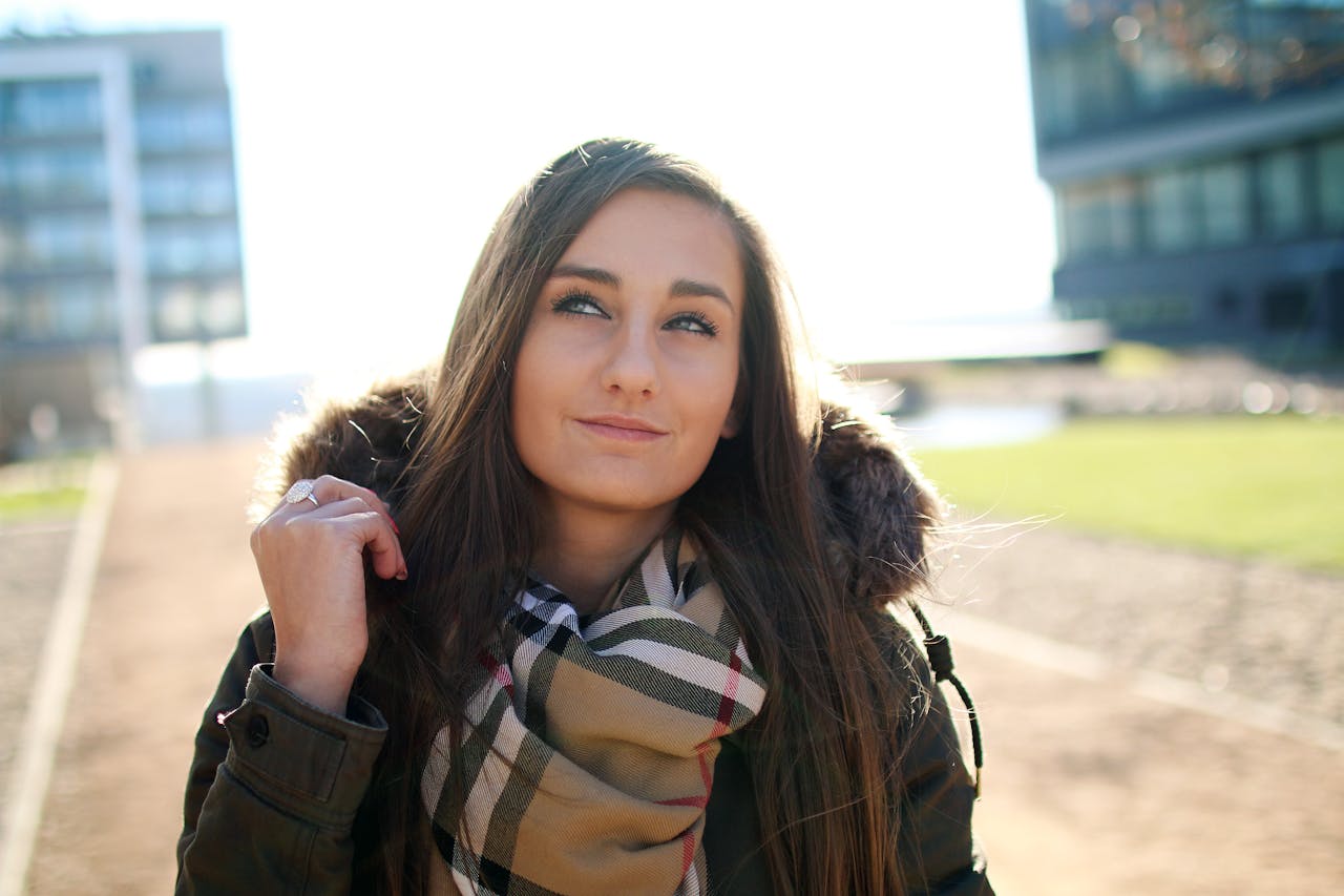 Woman Wearing Black Parka Jacket Smiling